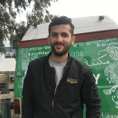 Dana Sediq in front of the van at OHF